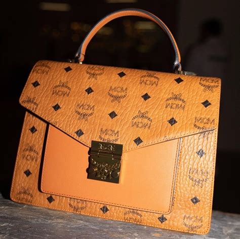 how to know if a mcm bag is fake|how to check for genuine mcm bags.